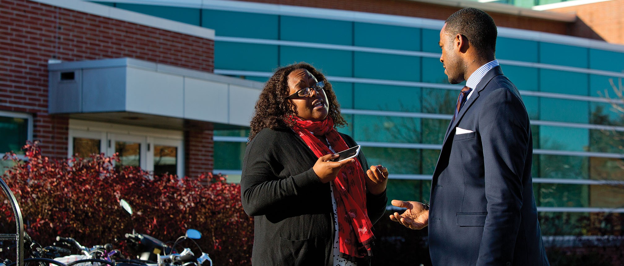 Range confers with Qiana Green, a doctoral student in the Higher, Adult and Lifelong Education program at Michigan State. Green has been a mentor and friend to Range since his arrival on the East Lansing campus.