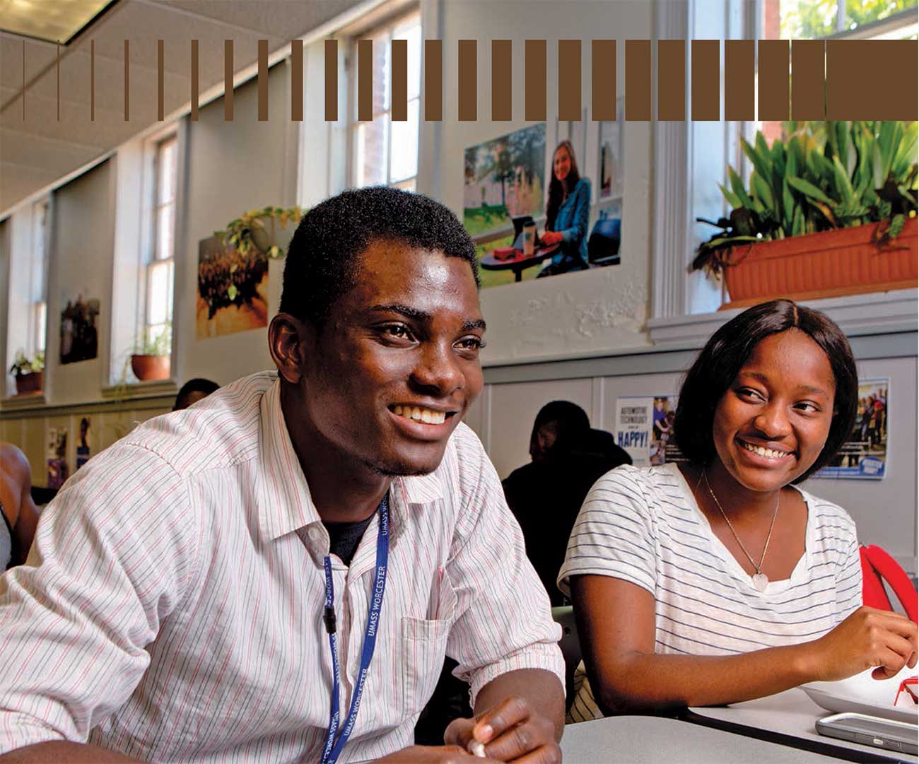 Computer science major Kwame Ofori with classmate Lordia Larbi-Asare at Quinsigamond Community College in Worcester, Mass.