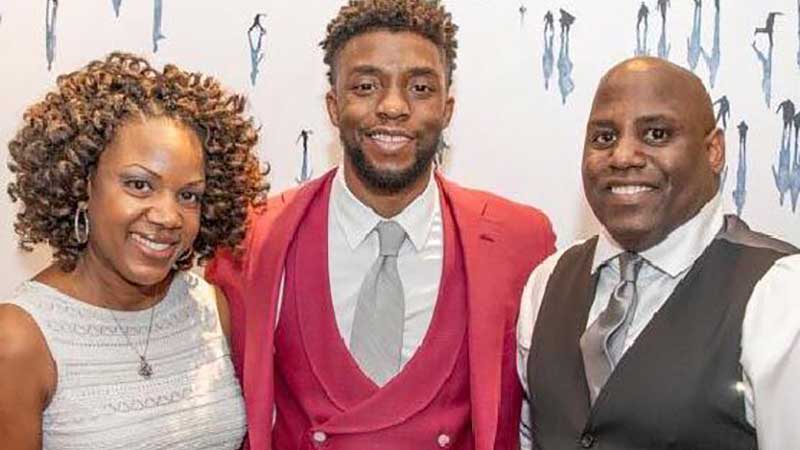 Chadwick Boseman with Danette and William Howard II.