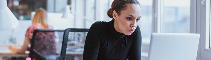 Black female IT worker, stock photo.