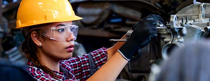 Female factory worker, stock photo.