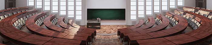 A wide shot of an empty college classroom.