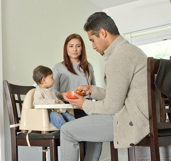 Damaris Ortiz and her boyfriend, Yasert Ortega, share breakfast with their 1-year-old son, Ezra, in their apartment in San Rafael, Calif. Ortiz, 29, left Mexico as a teenager, worked hard to excel in high school and then spent nearly 10 years pursuing an associate degree, which she earned in 2012.