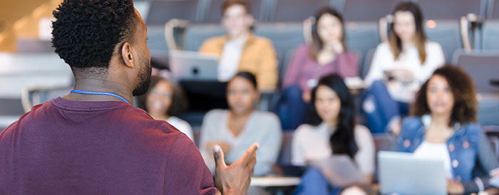 Students with instructor in an alternative classroom setting.