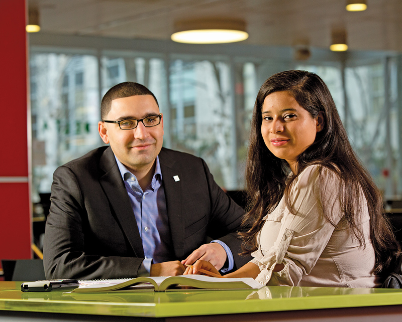 Northeastern University student Olga Estephanie Menjivar Garcia says her mentor, Walter Maya (left), has served as a steady source of support. Having Maya as a mentor “was very inspiring for me,” she says. “He had a difficult time to get to where he is. I was also struggling.” With Maya’s help, however, Olga overcame those pre-college struggles and earned a full scholarship to Northeastern.