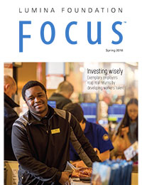 Cover of Focus magazine depicts Ali Hassan of Wegmen's work scholarship program at work in a grocery store environment.