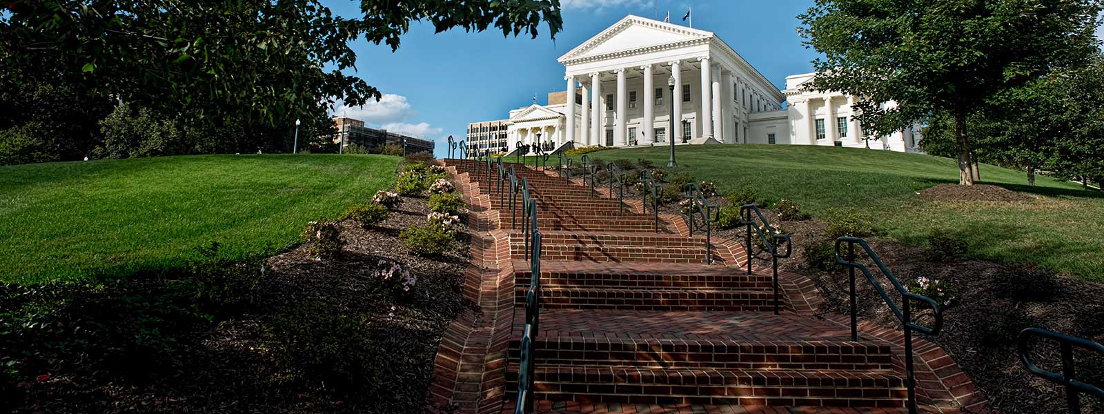 Brick steps leading up a hill to the Virginia State Capitol building