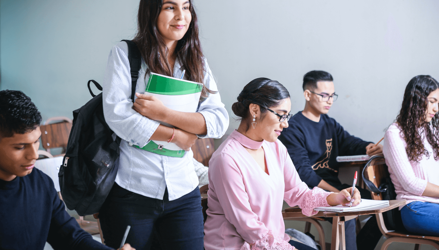 Student standing in classroom