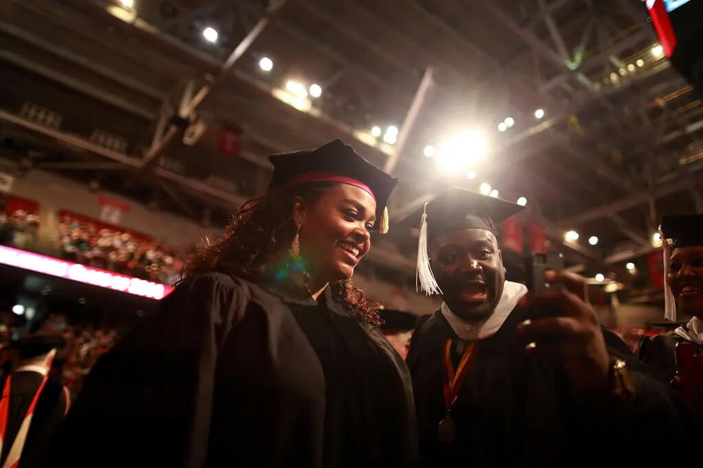 The singer Jill Scott, who was being given an honorary doctorate, at graduation ceremonies at Temple University in Philadelphia this month. The pay disparity between those with college degrees and those without continues to grow.Credit...