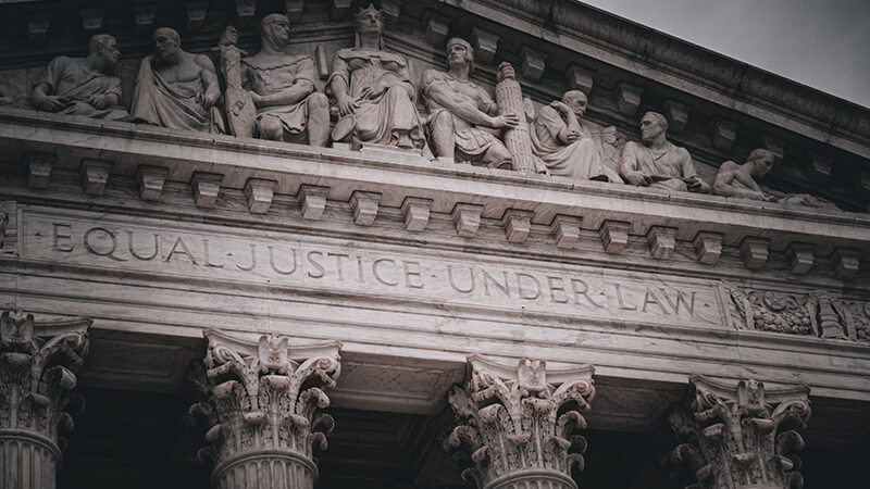 Front facade of the Supreme Court building reads “Equal justice under law.”